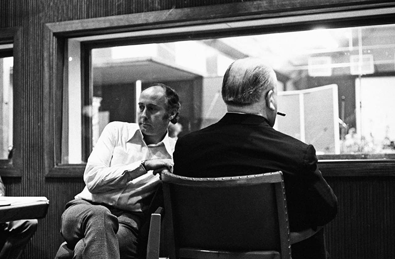 Henry Mancini and Alfred Hitchcock at the recording session for the composer's FRENZY score